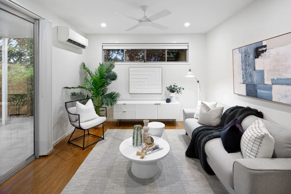 Modern living room with wall-mounted split-system air conditioner