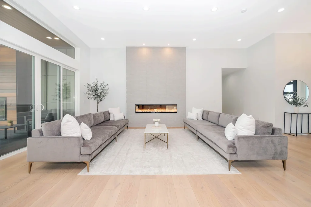 Bright contemporary living room representing whole-home ducted heating comfort