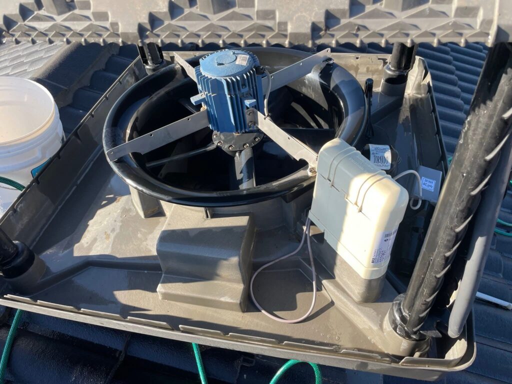 Evaporative cooling unit after routine service and cleaning around the fan assembly